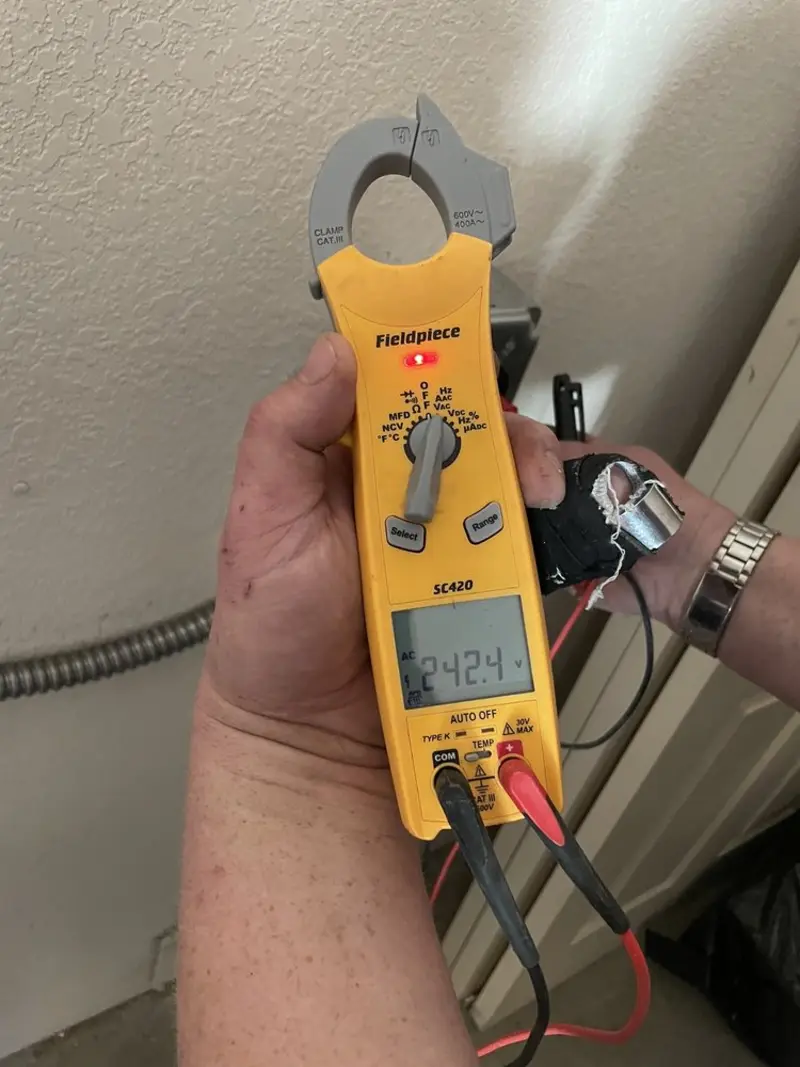 Voltage testing with clamp meter during Generator Installation in Los Banos